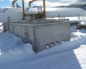 precast concrete 3 phase electrical vault in snow